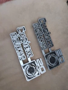 1973 - 1980 Square Body Chevrolet Custom Deluxe 20 Fender Side Emblem Pair - Picture 1 of 9