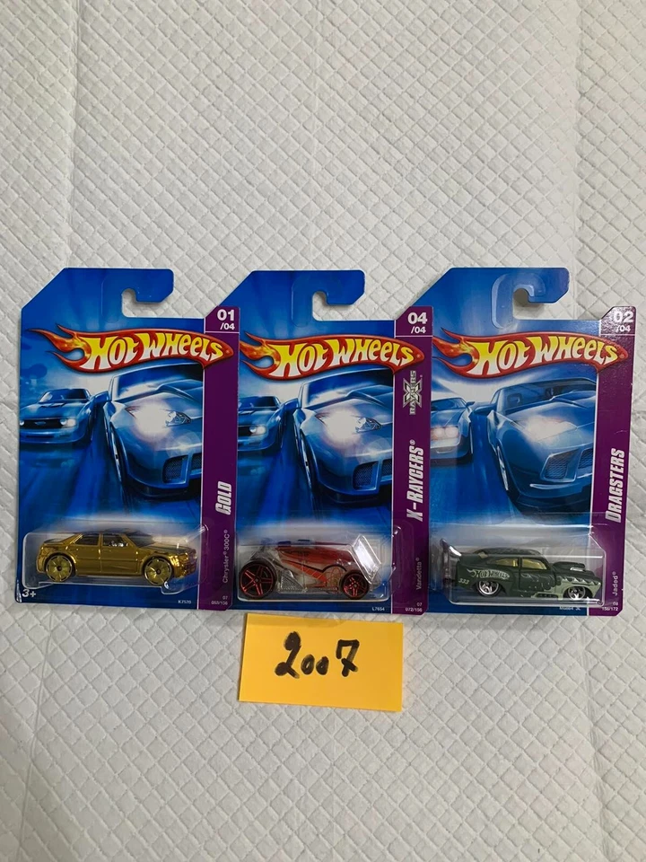 LOTE DE 3 CARROS HOT WHEELS 2007 SÉRIE RAIO X/OURO/DRAGSTER  - Imagem 1 de 1