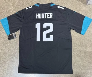 Camiseta deportiva Jacksonville Jaquars # 12 negra Travis Hunter - Imagen 1 de 2