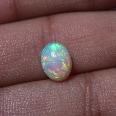 1.8 Cts 10x7.7 MM Natural AAA Flashy Multi Fire Ethiopian Opal Oval Cabochon - Image 1 of 4