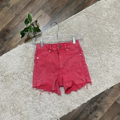 Pantalones cortos de mezclilla American Eagle 00 rosa deshilachado lavado a la piedra tiro alto inspiración vintage Foto 1 de 4