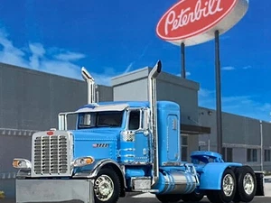 1/64 DCP BABY BLUE PRIDE & CLASS PETERBILT 389 W/ 36" SLEEPER - Picture 1 of 6