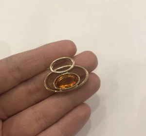 Colgante Pierre Lang PL dorado joyería de moda - Imagen 1 de 6