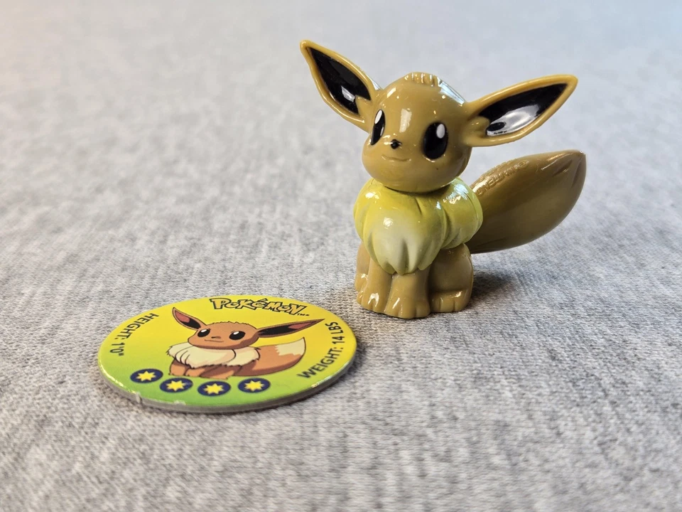 Figura de acción vintage 1998 Pokemon Eevee Tomy con Collector Pog Nintendo #133 Foto 1 de 4