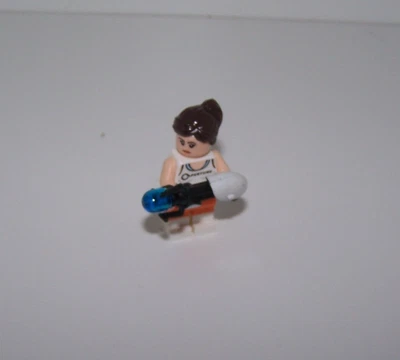 LEGO Dimensions: Chell from Portal - Minifigura con pistola Portal (71203 / dim006) Foto 1 de 4