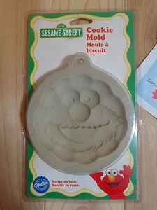 Molde de galletas Wilton 4" SESAME STREET ELMO 2306-360 1998 receta en la parte posterior nuevo en paquete - Imagen 1 de 3