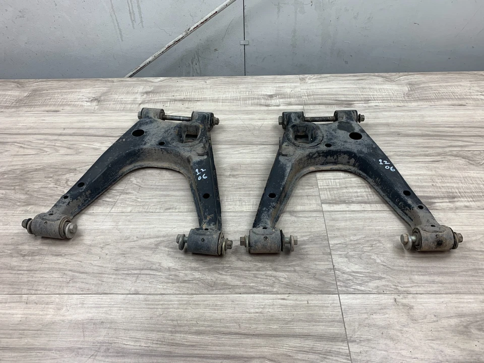 Juego de brazo de control inferior trasero Mazda Miata 1999-2005 OEM conductor pasajero nuevo en caja *leer* Foto 1 de 4