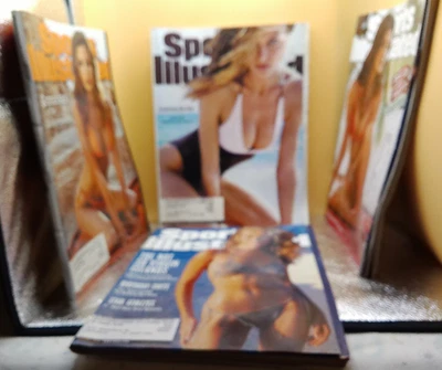 Sports Illustrated swimsuit magazine Yamila Heidi Klum Elsa Rebecca Romijn lot 4 Foto 1 de 4