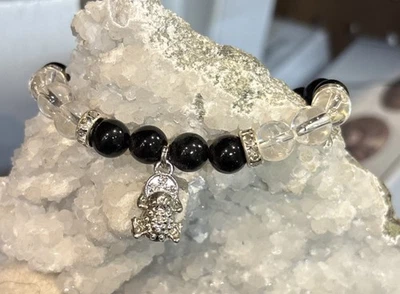 Pulsera redonda de obsidiana y cuarzo brillo dorado de 8 mm con dije de rana de dinero Foto 1 de 4