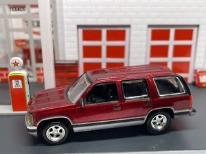 1992-1999 Chevy Tahoe 4 Door SUV Burgundy 1/64 Limited Edition - Picture 1 of 9