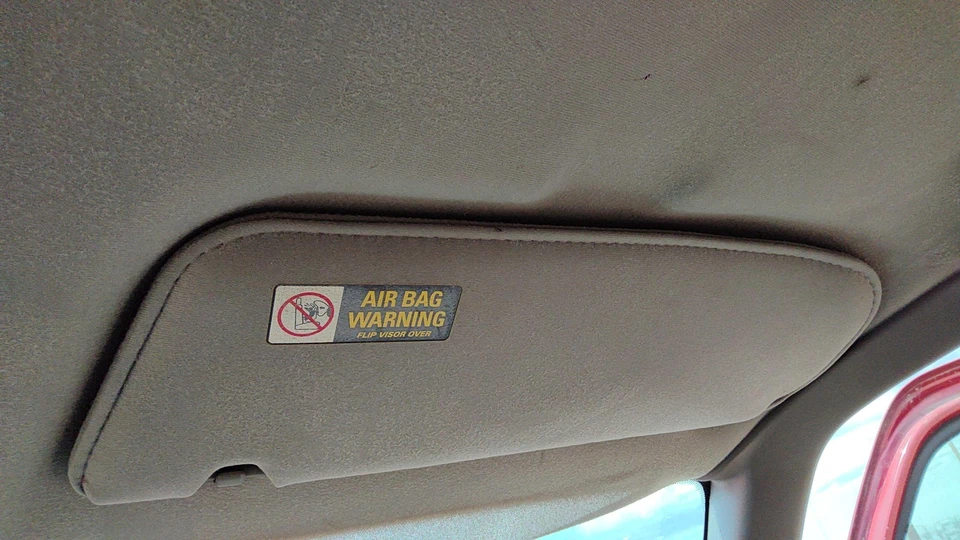 Mazda B2500 1999 pasajero derecho parasol OEM gris V2 Foto 1 de 4