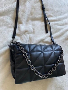 Black quilted leather look handbag with gun metal grey silver chain. - Picture 1 of 7