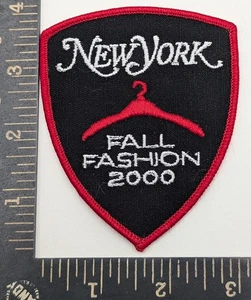 New York Fall Fashion 2000 Patch Red Hanger Shield Iron-On Collectible - Picture 1 of 2