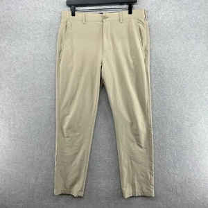 Izod Pants Mens Size 33x32 Beige Performance Flat Front Golf Chino Khakis - Picture 1 of 11