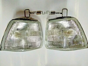 Mazda 626 hatchback 5 door 1986-1987 front corner turn signal lights lamp pair - Picture 1 of 11