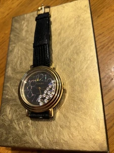 Orologio donna Cardini, tono oro, pelle nera, cristalli galleggianti batteria nuova - Foto 1 di 14
