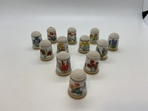 Juego de 12 dedales de porcelana de porcelana Franklin 1978 como nuevos - Imagen 1 de 12