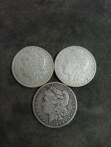 (3) 1897-O Morgan Silver Dollar - Picture 1 of 10