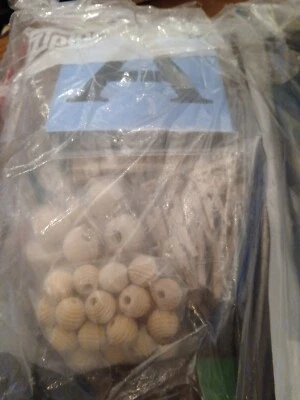 package of craft supplies ,wooden ball ,gemstones,clothes pins,letters - Image 1 of 4