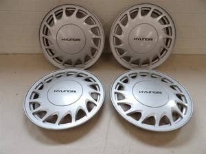 HYUNDAI EXCEL 1990 15 spoke 13inch WHEEL COVERS HUB CAPS SET OF 4 SILVER OEM - Picture 1 of 6