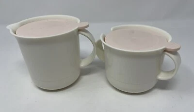Tupperware Vintage Coffee Creamer & Sugar set Ivory Beige w/ Pink Lids 2309 2310 - Image 1 of 4