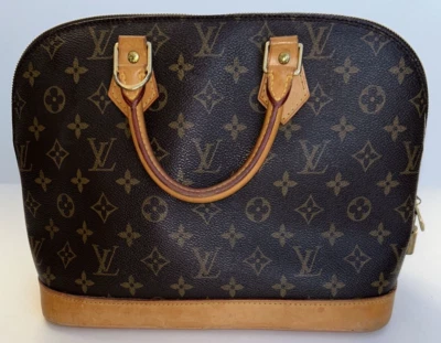 Auténtico bolso de mano Louis Vuitton Alma PM marrón con monograma de cuero Foto 1 de 4