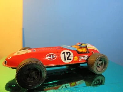 Coche de carreras de hojalata vintage de 5,5 pulgadas, litografía, logotipo STP rojo #12 Foto 1 de 4