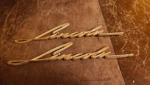 Vtg Lincoln Continental 1958-1960 Gold Badge Emblem Ornament lot of 2 - Picture 1 of 4