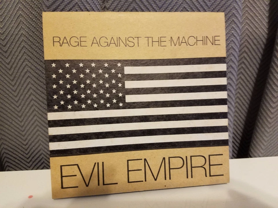 RAGE AGAINST THE MACHINE EVIL EMPIRE Advance Silkscreened NM 7 inch SCARCE 1995 - Image 1 of 3