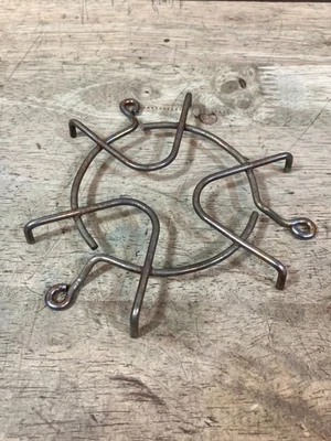 Estufa Coleman 502 - Rejilla - Decoloración Foto 1 de 4