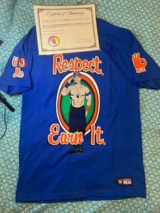 Camiseta AUTOGRAFIADA John Cena Respect Earn It WWE Autenticidad 1/10 Nunca Usada - Imagen 1 de 6
