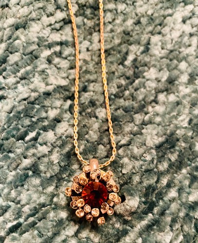 Splendida collana vintage Christian Dior rubino cristallo fumé Sunburst