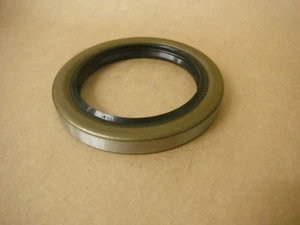 TCM OIL SEAL 243353 TB DOUBLE LIP WITH SPRING 2-7/16X3-11/62X3/8 - Picture 1 of 3