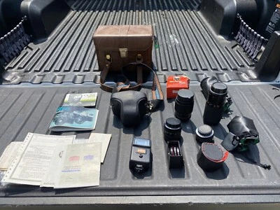 CÁMARA VINTAGE YASHICA FX-D CUARZO 50 MM CON 5 LENTES, estuche, correa, flash y manual Foto 1 de 4