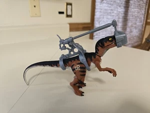 Jurassic Park Lost World JP06 Raptor/Velociraptor variante occhio giallo Kenner - Foto 1 di 4
