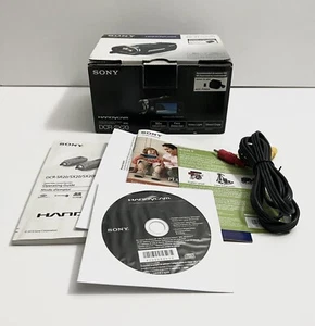 Sony DCR-SX20 HandyCam Box Manuels Cordon et Disque Logiciel PAS D'APPAREIL PHOTO - Photo 1 sur 8