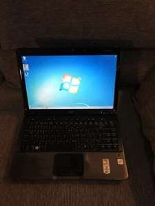 HP Pavilion dv2710us 14"(AMD Turion 64x2/320GB HD/4GB/Win7/Office07)Excellent - Picture 1 of 12