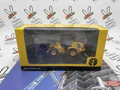Die Cast Mouvement Terra " Chargeur Gommée New Holland W270B " 1/87 - Photo 1/3