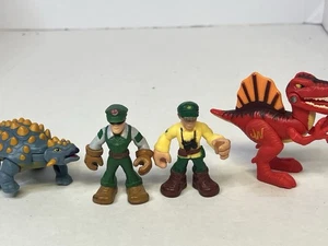 Playskool Heroes Jurassic World Figuren 4 Stück Park Rangers und Dinos - Bild 1 von 10