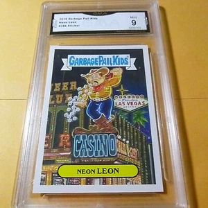 NEON LEON 2016 GARBAGE PAIL KIDS AS AMERICAN AS APPLE PIE STICKER 38B GRADED 9 - Picture 1 of 2