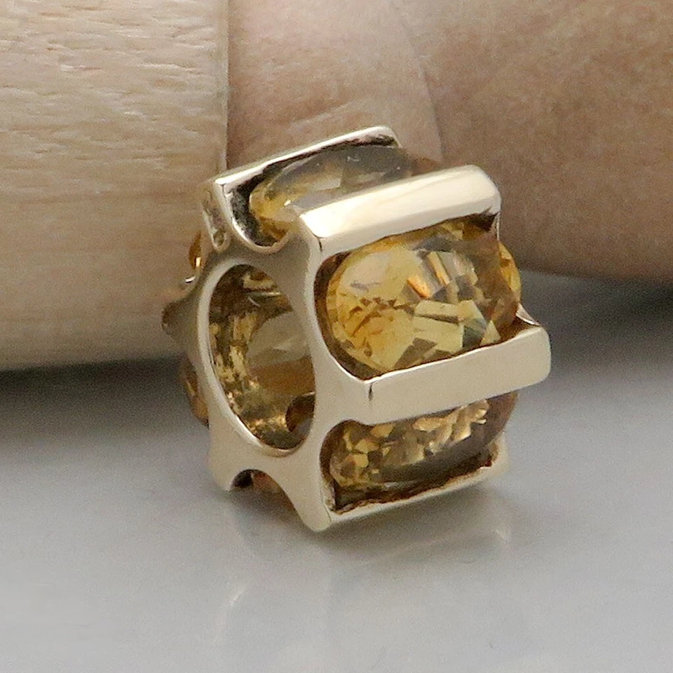 Anhänger Läufer mit Citrin Besatz in 375/9K Gelbgold - Bild 1 von 4