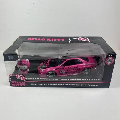 Jada Hello Kitty y Nissan Skyline GT-R 2002 escala 1:24 diecast coche y figura original Foto 1 de 4