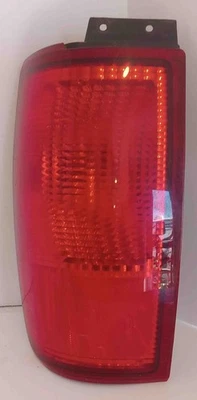 Luz trasera Navigator LH 2000 montada en cuarto usada OEM Foto 1 de 4