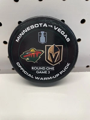 2025 Stanley Cup Playoffs Vegas vs Minnesota Wild Hockey Warm Up Puck Game 3 - Image 1 of 2
