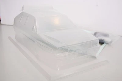 THE RALLY LEGENDS Carrozzeria Trasparente Lancia Delta EVO + Adesivi LANCIA - Immagine 1 di 4