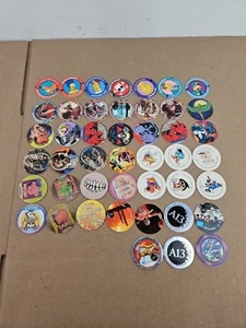 LOTE DE 45 PIEZAS POG Simpsons Spiderman Ghost Rider Bobbies World - Imagen 1 de 8