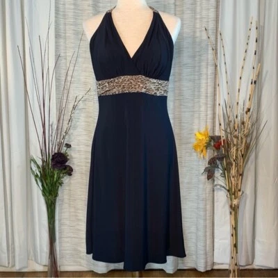 Vestido Phoebe Couture negro y estampado de leopardo halter top línea A. Foto 1 de 4