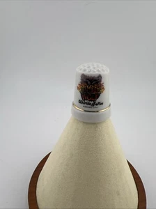 Dedal de porcelana vintage Worlds of Fun Kansas City Timber Wolf nuevo ¡¡LEER!!! - Imagen 1 de 4