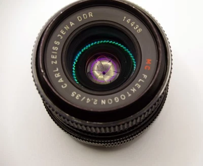 Carl Zeiss Jena Flektogon DDR Red MC 35mm F/2.4 M42 Screw Mount Lens with caps - Image 1 of 4