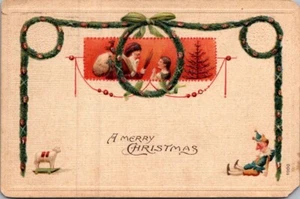 EINE FROHE WEIHNACHTEN Spielzeug und Kränze um 1909 geprägte Postkarte - Bild 1 von 2